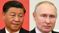 (FILES) (COMBO) This combination of pictures created on December 30, 2022 shows China's President Xi Jinping (L); and Russian President Vladimir Putin (R) (Photo by Noel CELIS and Mikhail Metzel / various sources / AFP)
