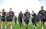 Al Gharafa players during a training session on the eve of the match.