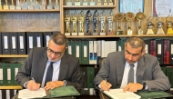 Es’hailSat, and SNRT officials signing the agreement.
