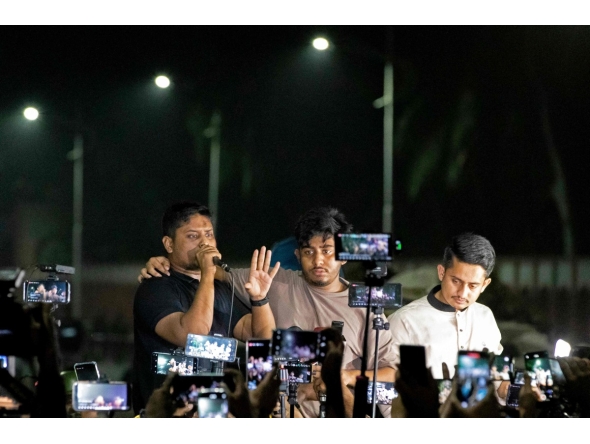 File photo: Student leaders and activists address protestors during a demonstration in Dhaka on October 22, 2024. (Photo by Abdul Goni / AFP)