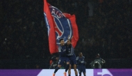 Paris Saint-Germain's French forward #29 Bradley Barcola (R) celebrates with Paris Saint-Germain's French midfielder #14 Desire Doue after scoring a goal during the UEFA Champions League, league phase football match between Paris Saint-Germain and Manchester City at the Parc des Princes Stadium in Paris on January 22, 2025. (Photo by FRANCK FIFE / AFP)
