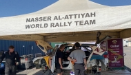 Autotek technicians work to prepare Nasser Saleh Al Attiyah’s car for Oman International Rally.