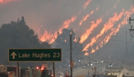 Flames from the Hughes Fire burn a hillside in Castaic, a northwestern part of Los Angeles County, California, on January 22, 2025. Photo by Robyn Beck / AFP.