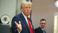 US President Donald Trump gestures as he leaves after speaking at the White House on January 21, 2025, in Washington, DC. (Photo by Jim Watson / AFP)