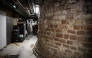 This photograph shows remains of a Roman Tower, located in a supermarket storage place in Strasbourg, eastern France, January 17, 2025. (Photo by Esa Rancel / AFP)
