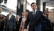 (FILES) US Secretary of State Marco Rubio and his wife Jeanette Rubio arrive to speak to employees upon arrival at the State Department in Washington, DC, on January 21, 2025. (Photo by ANDREW CABALLERO-REYNOLDS / AFP)
