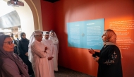 Minister of State and President of Qatar National Library H E Dr. Hamad bin Abdulaziz  Al Kawari and other officials during the exhibition opening. 