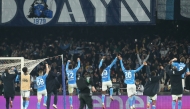 Napoli's player celebrate after winning the Italian Serie A football match between Napoli and Juventus at the Diego Armando Maradona stadium in Naples on January 25, 2025. (Photo by Carlo Hermann / AFP)
