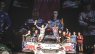 Nasser Saleh Al Attiyah and his co-driver Candido Carrera celebrate their victory. 