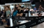 Brazilians who were deported from US wait at the departure lounge at Eduardo Gomes International Airport in Manaus, Amazonas state, on January 25, 2025. Photo by MICHAEL DANTAS / AFP.
