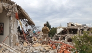 Photo used for representational purposes. A Lebanese soldier stands guard in a residential area that was devastated by the war between Israel and Hezbollah, in the southern coastal town of Naqura, on the border with Israel on January 22, 2025. Photo by Anwar AMRO / AFP.