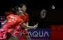 China's Guo Xinwa and Chen Fanghui hit a return against Japan's Hiroki Midorikawa and Natsu Saito in the mix doubles final match at the Daihatsu Indonesia Masters 2025 badminton tournament at Istora stadium in Jakarta on January 26, 2025. (Photo by BAY ISMOYO / AFP)
