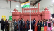 Officials and guests celebrating 76th Republic Day of India at MES Indian School.