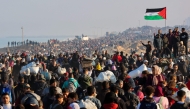 Displaced Gazans cross the Netzarim corridor from the southern Gaza Strip into Gaza City on January 27, 2025. (Photo by Omar Al-Qattaa / AFP)
 