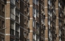 In this representational file photo, air conditioners are seen on the facade of a residential building in Malaga, southern Spain, on July 28, 2023. (Photo by JORGE GUERRERO / AFP)