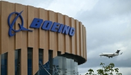 A logo is seen on the Boeing stand on the opening day of the Farnborough International Airshow 2024, south west of London, on July 22, 2024. Photo by JUSTIN TALLIS / AFP