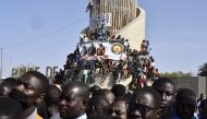 People gather to celebrate the withdrawal of Mali, Niger and Burkina Faso from the Economic Community of West African States (ECOWAS) in Niamey on January 28, 2025. (Photo by Boureima Hama / AFP)