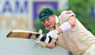 Australia's captain Steve Smith plays a shot during the first day of the first Test cricket match between Sri Lanka and Australia at the Galle International Cricket Stadium in Galle on January 29, 2025. (Photo by Ishara S. Kodikara / AFP)