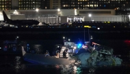 Emergency response units assess airplane wreckage in the Potomac River near Ronald Reagan Washington Airport on January 30, 2025 in Arlington, Virginia. Andrew Harnik/Getty Images/AFP