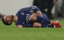 Paris Saint-Germain's French midfielder #33 Warren Zaire-Emery reacts after sustaining an injury during the UEFA Champions League football match VfB Stuttgart vs Paris Saint-Germain in Stuttgart, southwestern Germany, on January 29, 2025. (Photo by FRANCK FIFE / AFP)
