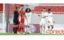 Al Sadd's Akram Afif (centre) and Rafa Mujica (second right) celebrate during the match.