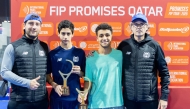 Victorious Aspire Academy players pose for a photo with officials.