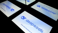 This photograph shows screens displaying the logo of DeepSeek, a Chinese artificial intelligence company which develops open-source large language models, in Toulouse, southwestern France on January 29, 2025. Photo by Lionel BONAVENTURE / AFP