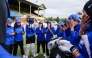 Afghanistan Women's XI players say a prayer before the cricket match between Afghanistan Women's XI and Cricket Without Borders XI at Junction Oval in Melbourne on January 30, 2025. (Photo by Martin Keep / AFP)