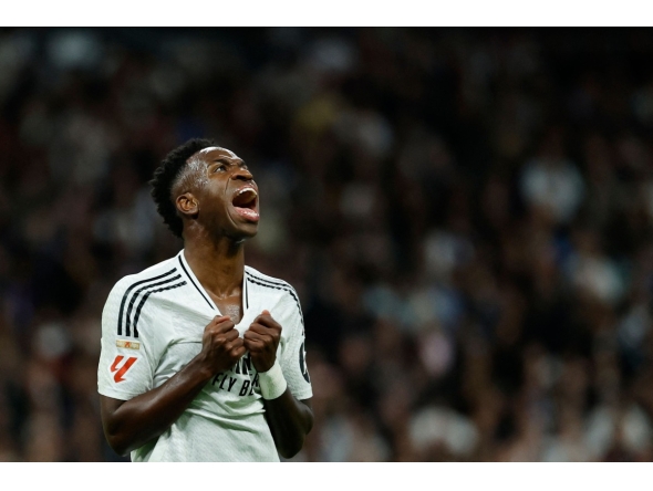 File: Real Madrid's Brazilian forward Vinicius Junior during the Spanish league football match between Real Madrid CF and FC Barcelona at the Santiago Bernabeu stadium in Madrid on October 26, 2024. (Photo by Oscar Del Pozo / AFP)

