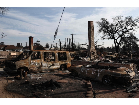 Vehicles which burned in the Eaton Fire are marked 'NOT EV' as EPA hazardous materials disposal ramp up on January 31, 2025 in Altadena, California. Mario Tama/Getty Images/AFP