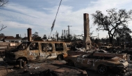 Vehicles which burned in the Eaton Fire are marked 'NOT EV' as EPA hazardous materials disposal ramp up on January 31, 2025 in Altadena, California. Mario Tama/Getty Images/AFP