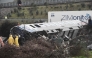 Police and emergency crews search through the debris of a crushed wagon for second day after a train accident in the Tempi Valley near Larissa, Greece, March 2, 2023. (Photo by Sakis MITROLIDIS / AFP)