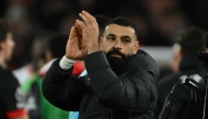 Liverpool's Egyptian striker #11 Mohamed Salah applauds fans after the English Premier League football match between Bournemouth and Liverpool at the Vitality Stadium in Bournemouth, southern England on February 1, 2025. Liverpool won the game 2-0. (Photo by Glyn KIRK / AFP) 