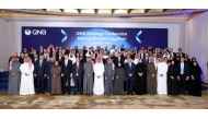 Officials pose for a group photo during the conference.