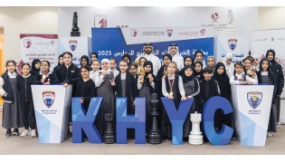 The medal winners of the Al Kharaitiyat Club Chess Championship pose for a photograph with QCA officials.