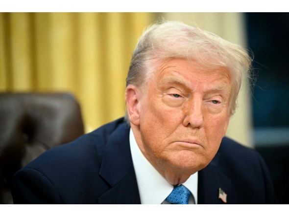 US President Donald Trump speaks to the press after signing an executive order in the Oval Office of the White House in Washington, DC on January 31, 2025. Photo by Mandel NGAN / AFP