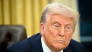 US President Donald Trump speaks to the press after signing an executive order in the Oval Office of the White House in Washington, DC on January 31, 2025. Photo by Mandel NGAN / AFP