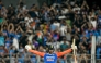 India's Abhishek Sharma celebrates after scoring a century (100 runs) during the fifth and final Twenty20 international cricket match between India and England at the Wankhede Stadium in Mumbai on February 2, 2025. (Photo by Punit PARANJPE / AFP)