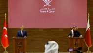 Prime Minister and Minister of Foreign Affairs H E Sheikh Mohammed bin Abdulrahman bin Jassim Al Thani and Minister of Foreign Affairs of Türkiye H E Dr. Hakan Fidan addressing a press conference. (AFP)