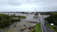 A handout photo taken on February 2, 2025 and released by the Queensland Fire Department on February 3, 2025 shows an aerial view of flood-affected areas around Townsville, Queensland. (Photo by Handout / Queensland Fire Department / AFP)