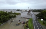 A handout photo taken on February 2, 2025 and released by the Queensland Fire Department on February 3, 2025 shows an aerial view of flood-affected areas around Townsville, Queensland. (Photo by Handout / Queensland Fire Department / AFP)