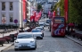 (FILES) Oslo Taxi's Tesla model Y (L) and the NIO ET5 electric vehicle from Nio Inc, a Chinese multinational electric car manufacturer, drive through the Norwegian capital Oslo, on September 27, 2024. (Photo by Jonathan NACKSTRAND / AFP)
