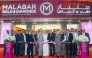 H E Vipul, Ambassador of India to Qatar, inaugurating the showroom of Malabar Gold & Diamonds at Muaither in the presence of Abdul Salam K P, Vice-Chairman of Malabar Group; Shamlal Ahamed, MD-International Operations, Malabar Gold & Diamonds; Santhosh T, Regional Head of Malabar Gold & Diamonds in Qatar; Naufal T, Zonal Head of Malabar Gold & Diamonds in Qatar; Al Shaikh Jasim Nasar Abdulla Ahmed Al Thani; Al Shaikh Abdulla Nasar Abdulla Ahmed Al Thani, other officials and guests.