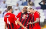 Al Rayyan players celebrate after Roger Guedes (right) scored their second goal.