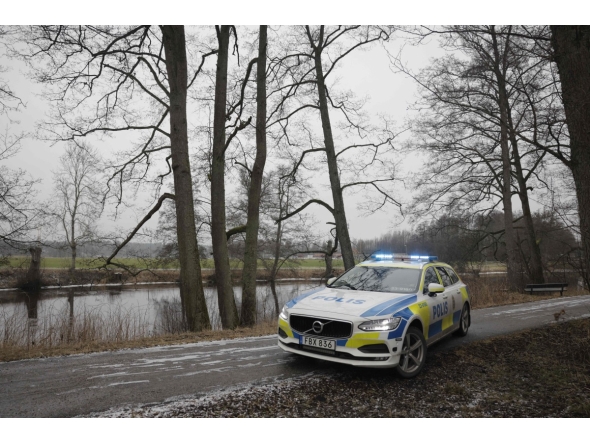 A police vehicle is seen near the Risbergska School in Orebro, Sweden, on February 4, 2025, following reports of a serious violent crime. Photo by Kicki NILSSON / TT NEWS AGENCY / AFP