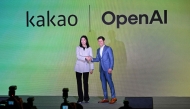 Open AI CEO Sam Altman (R) and Kakao CEO Chung Shin-a (L) pose for photos during a press conference at a hotel in Seoul on February 4, 2024. (Photo by Jung Yeon-je / AFP)