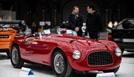 This photograph shows a 1950 Ferrari 166 MM Touring Barchetta during the press presentation of the exhibition 