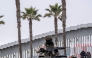 A Mexico's Army officer patrols the Mexican side of the US-Mexico border in Playas de Tijuana, Baja California state, Mexico, on February 3, 2025. (Photo by Guillermo Arias / AFP)
