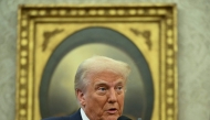 US President Donald Trump speaks before Pam Bondi is sworn in as US Attorney General in the Oval Office of the White House in Washington, DC, on February 5, 2025 (Photo by ANDREW CABALLERO-REYNOLDS / AFP)
