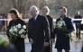 From left: Sweden's Queen Silvia and King Carl XVI Gustaf of Sweden, Prime Minister Ulf Kristersson with his wife Birgitta Ed arrive at the memorial to place flowers outside the adult education center Campus Risbergska school in Orebro, Sweden, on February 5, 2025. (Photo by Jonathan Nackstrand / AFP)